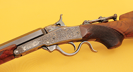 Engraved receiver and checkered pistol grip. Factory engraved Maynard rifles are extremely rare.